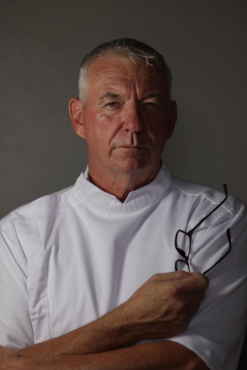 Me serious in chef jacket